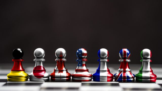 chess pieces in German, Japanese, Canadian, US, French, UK and Italian flags