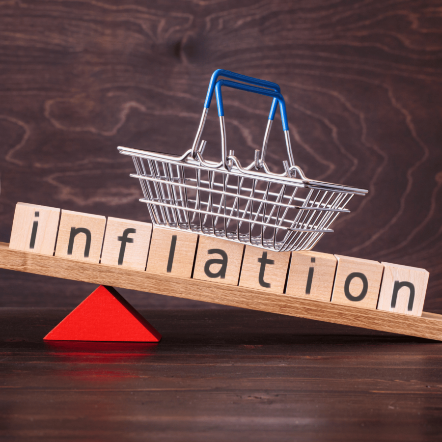 Inflation and a shopping basket being weighed down.