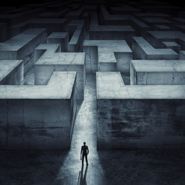 A maze with a person at the start, symbolising the challenges facing the economy